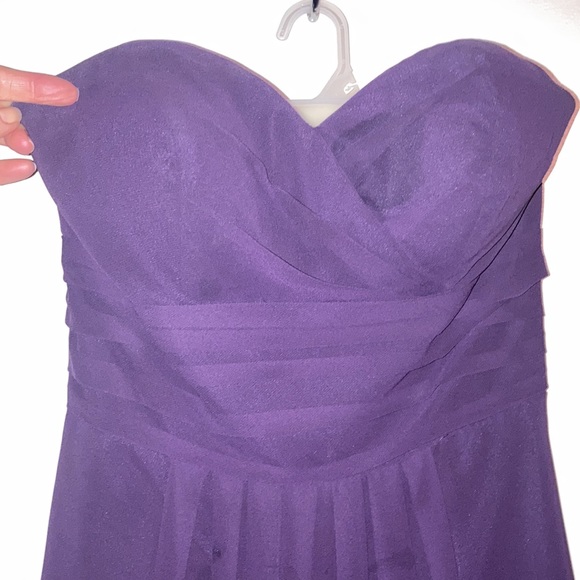 Bridesmaid dress, worn once! Deep purple with boning on the chest and sides.